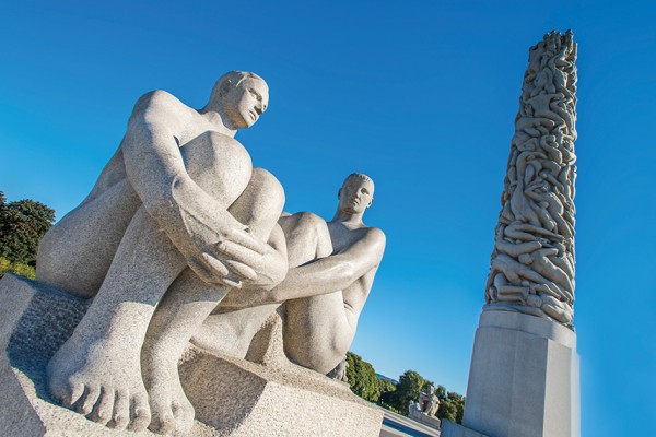 OSLO, NORWAY - AUGUST 27: Statues in Vigeland park in Oslo, Norway on August 27, 2012.The park covers 80 acres and features 212 bronze and granite sculptures created by Gustav Vigeland.